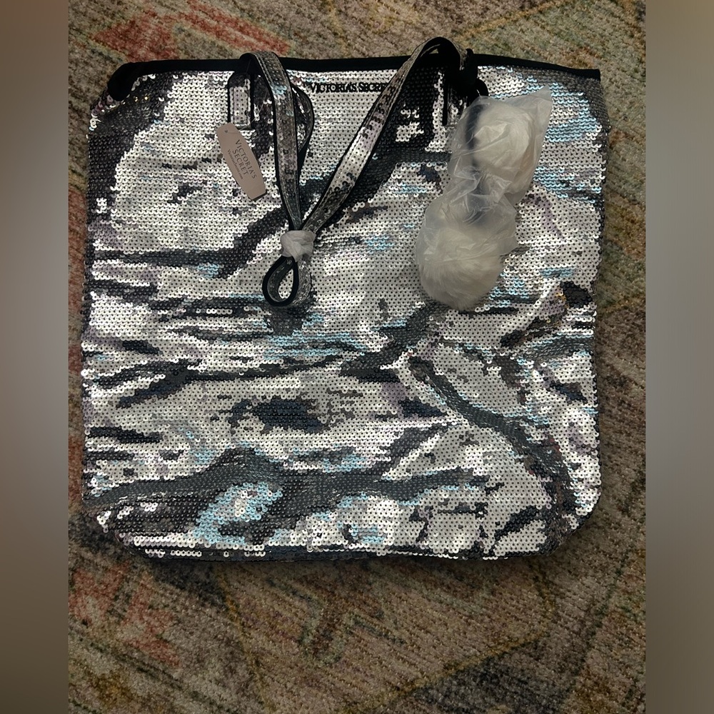 NWT - Silver sequin Victoria’s Secret bag.￼16 wide x 3.5 bottom.